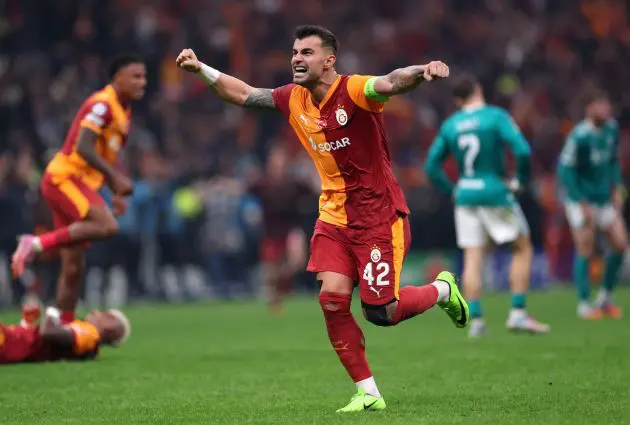 Galatasaray players celebrate their win over Liverpool