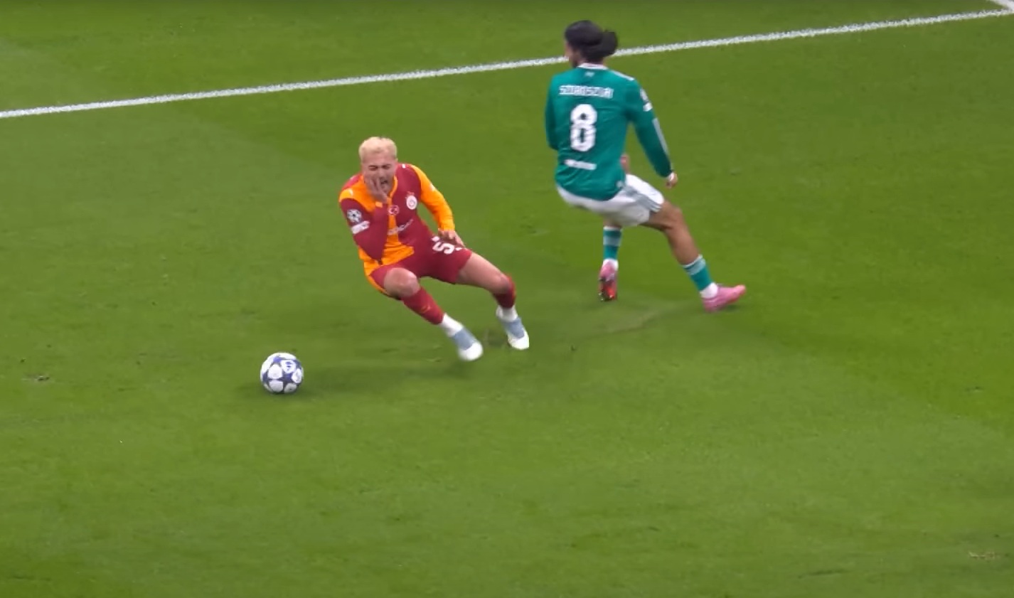 Baris Alper Yilmaz holds his face after the merest of contact from Dominik Szoboszlai