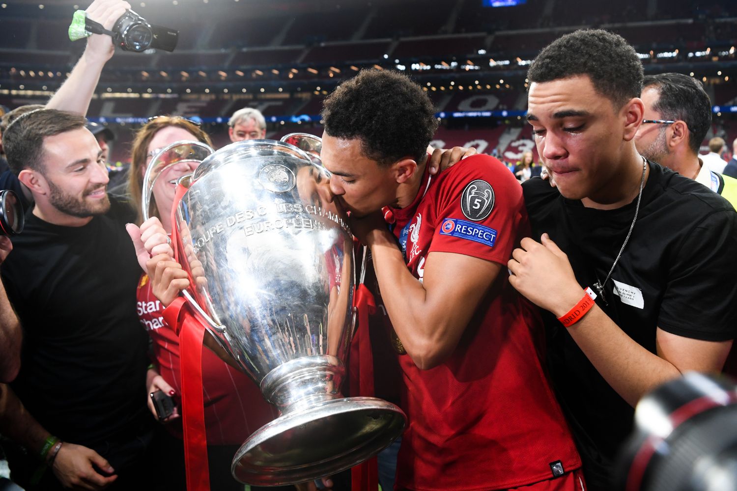 Trent Alexander-Arnold celebrates winning the Champions League with his brother