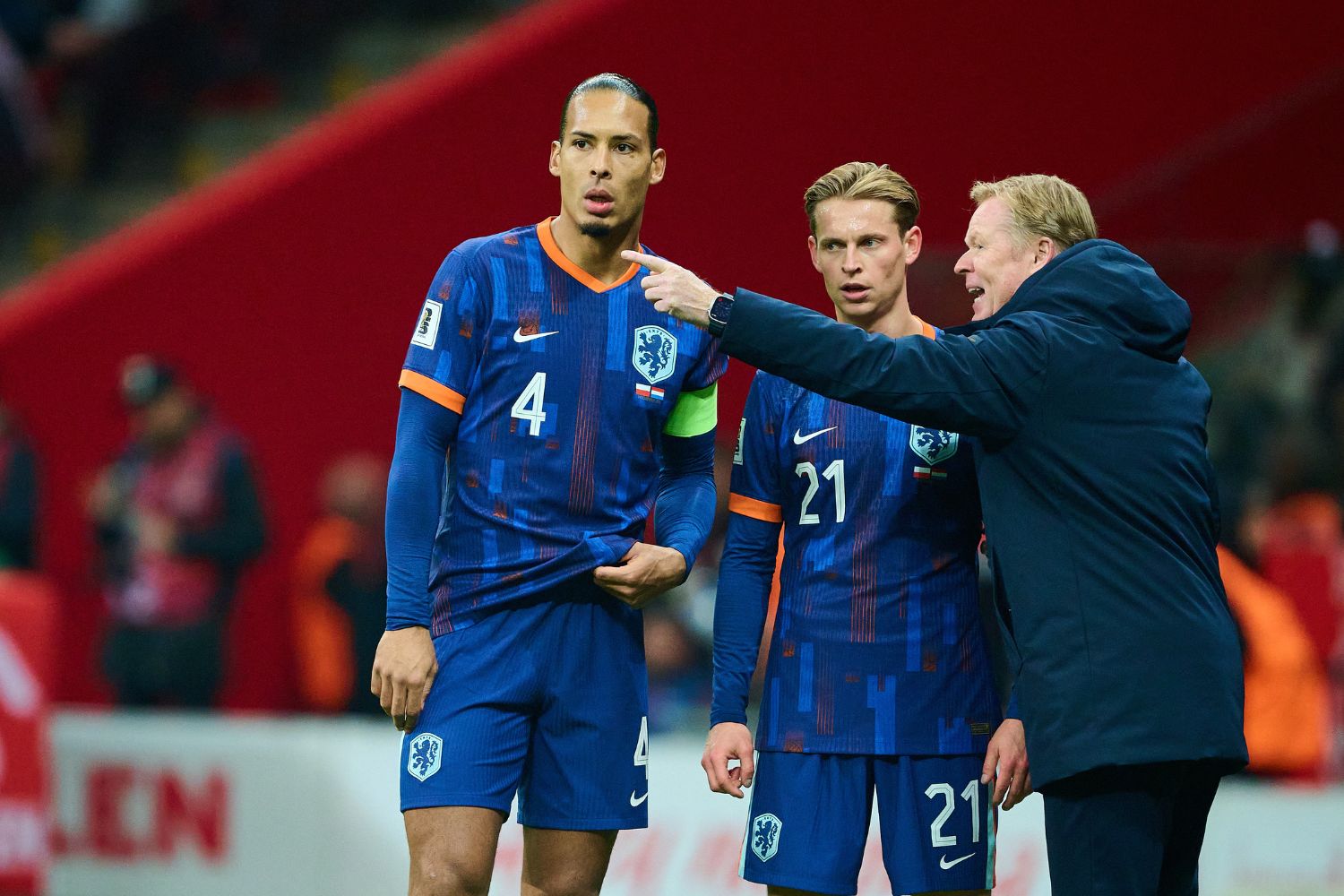 Virgil van Dijk and Frenkie de Jong speak with head coach Ronald Koeman of Netherlands