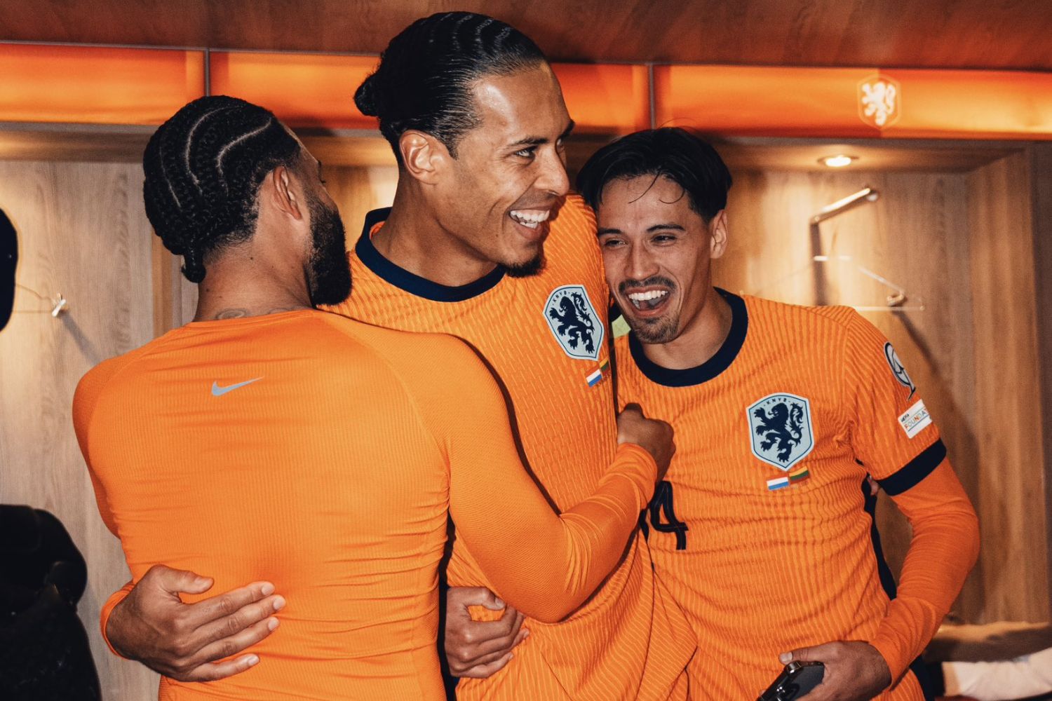 Virgil van Dijk congratulated by Memphis Depay and Tijjani Reijnders after breaking Dutch captain appearance record