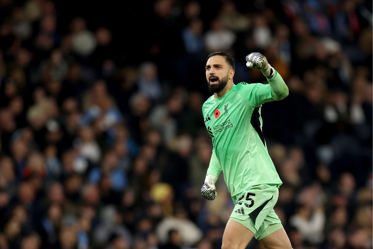 Giorgi Mamardashvili celebrates against Manchester City
