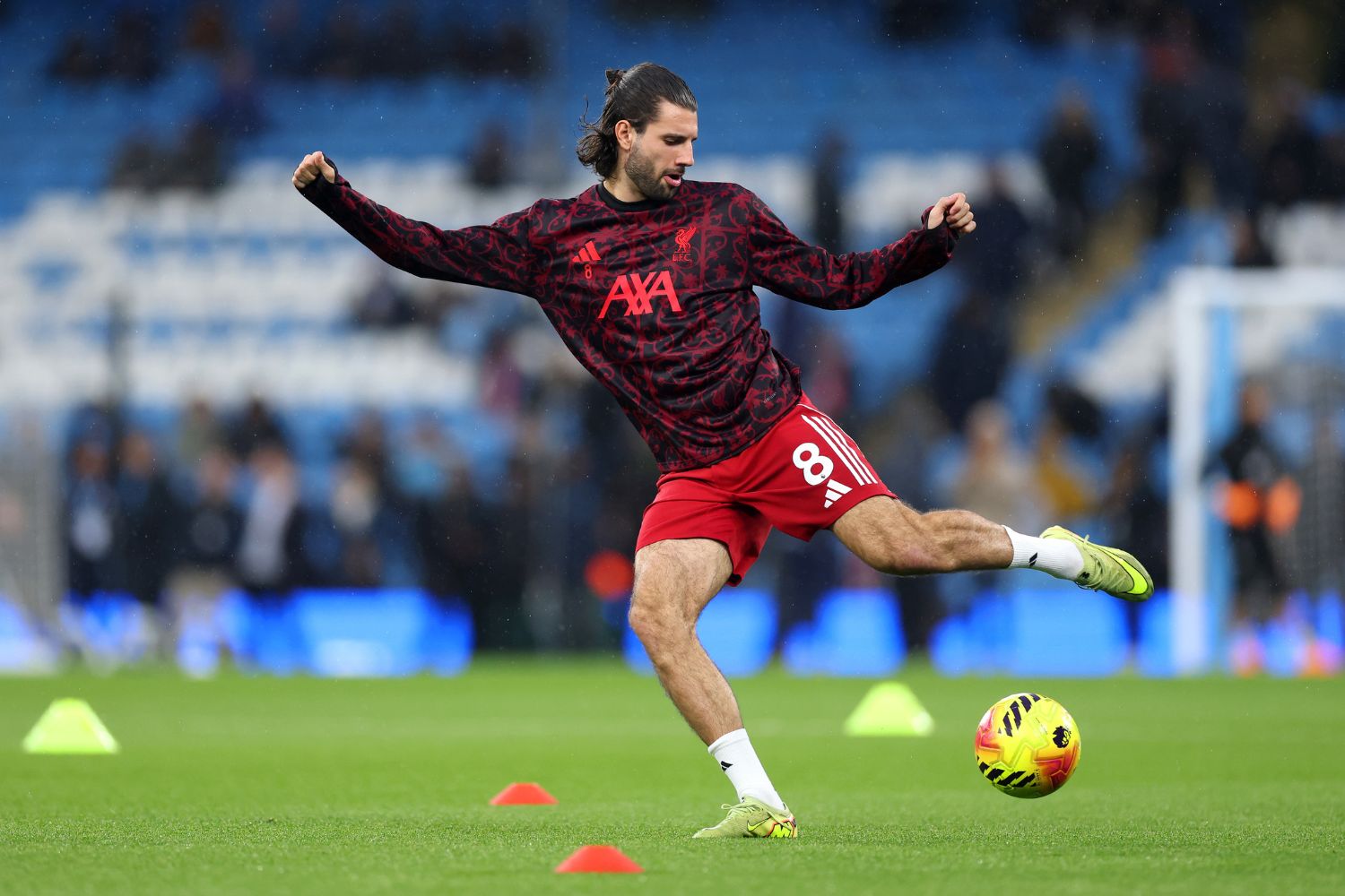 Dominik Szoboszlai warms up before playing Manchester City