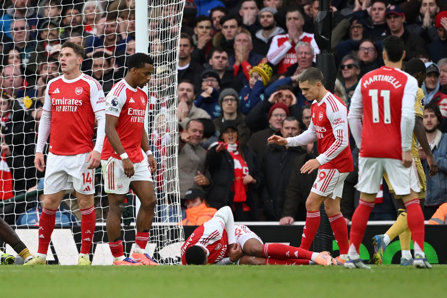 Arsenal player lies on the floor injured