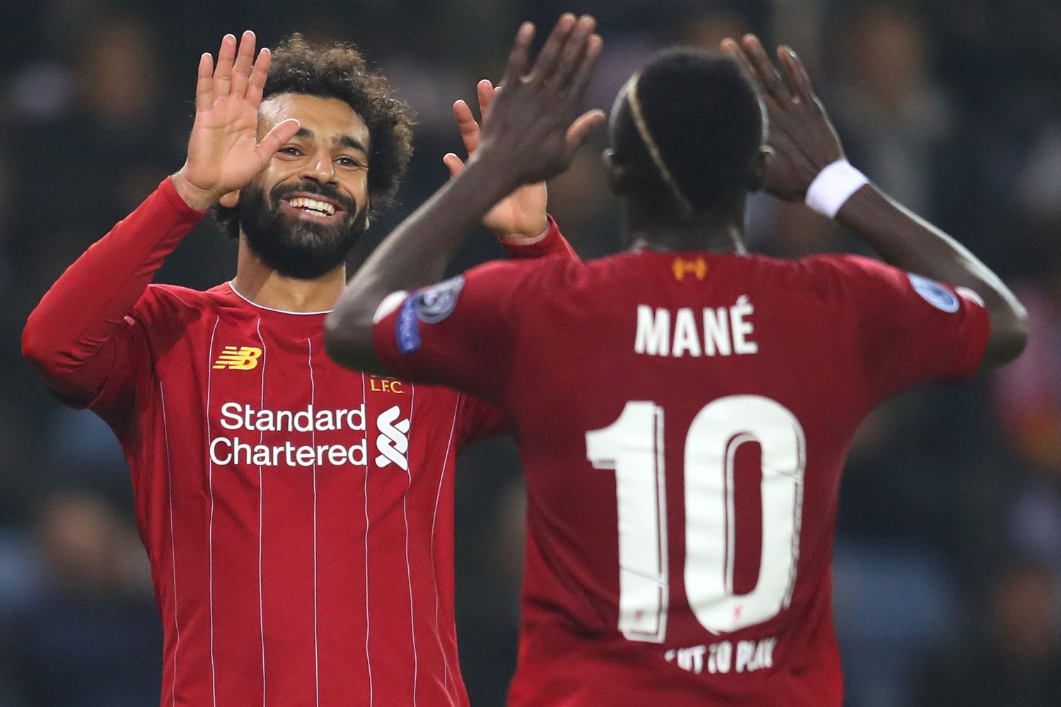 Mo Salah and Sadio Mane celebrate against Genk in 2019