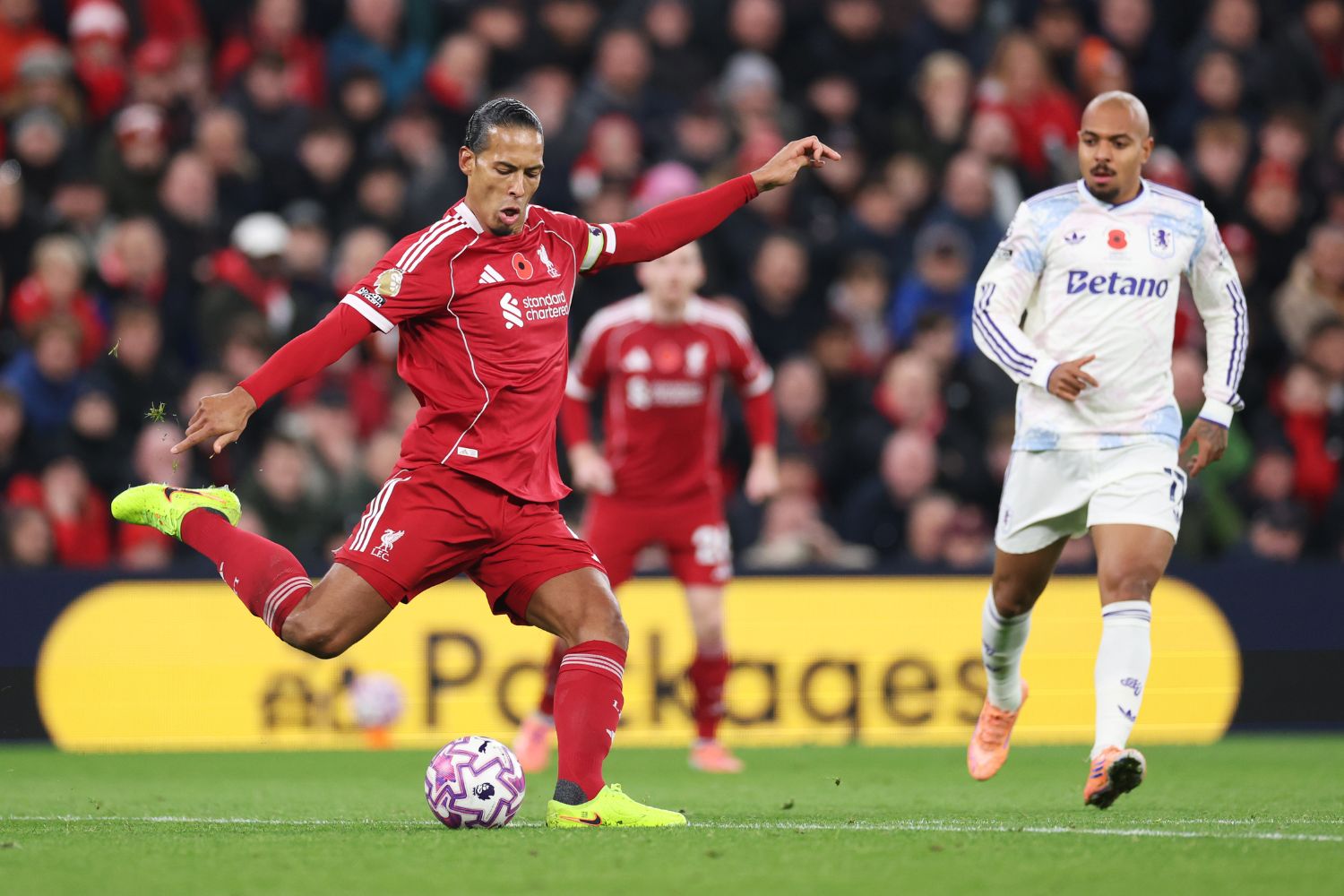 Virgil van Dijk of Liverpool passes the ball