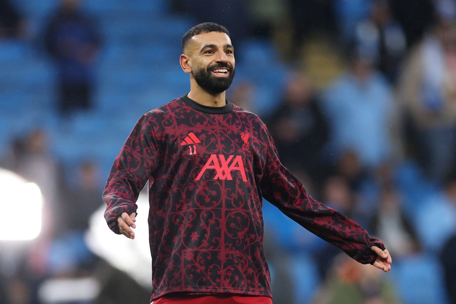 Mo Salah warms up for Liverpool against Man City