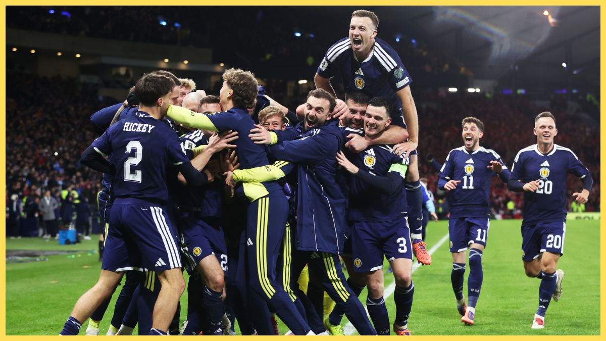 Andy Robertson celebrates with Scotland squad