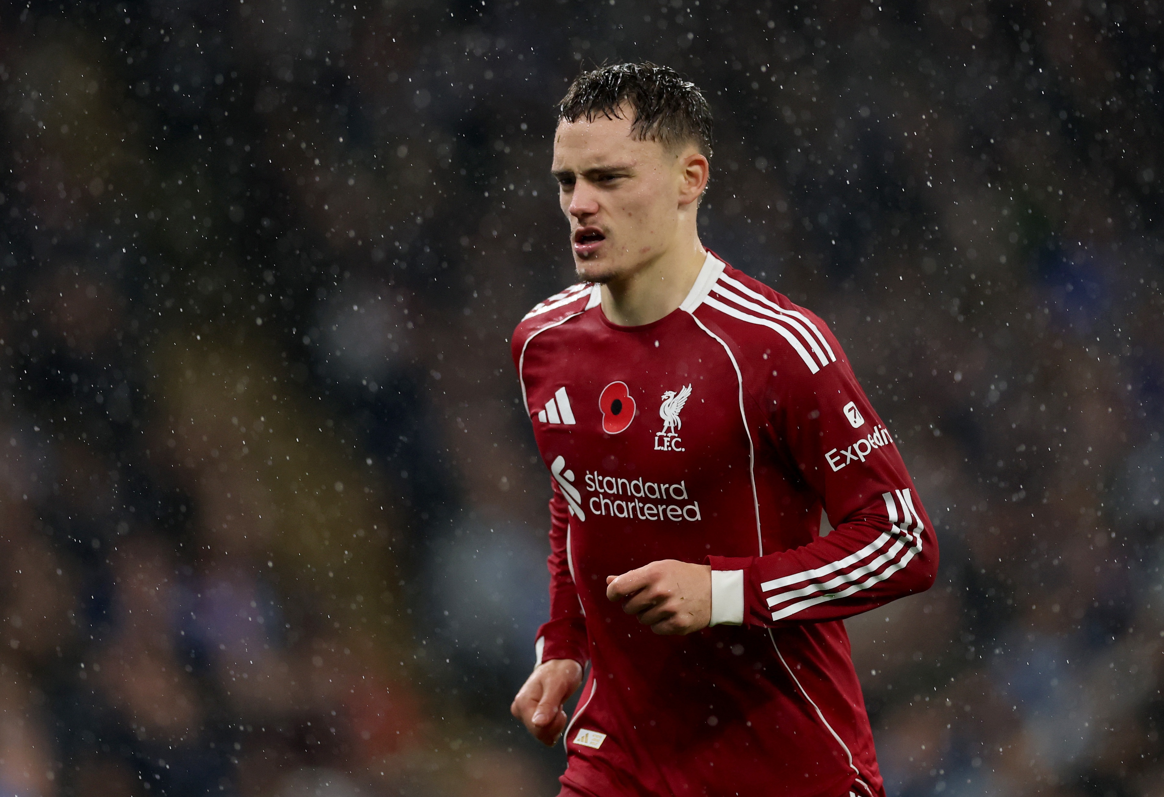 Florian Wirtz runs on the pitch during Premier League game.