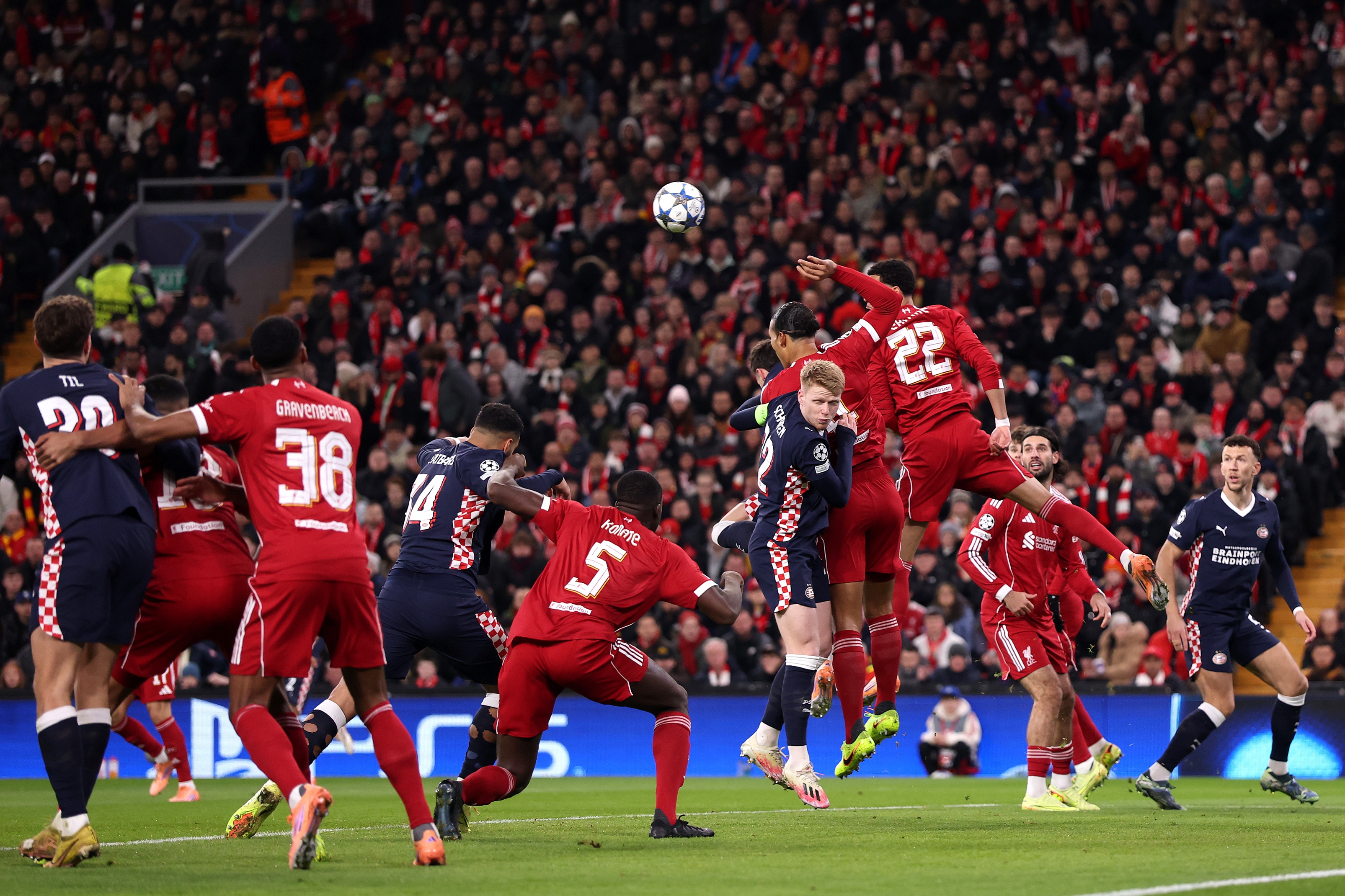 Virgil van Dijk handles the ball in mid-air.