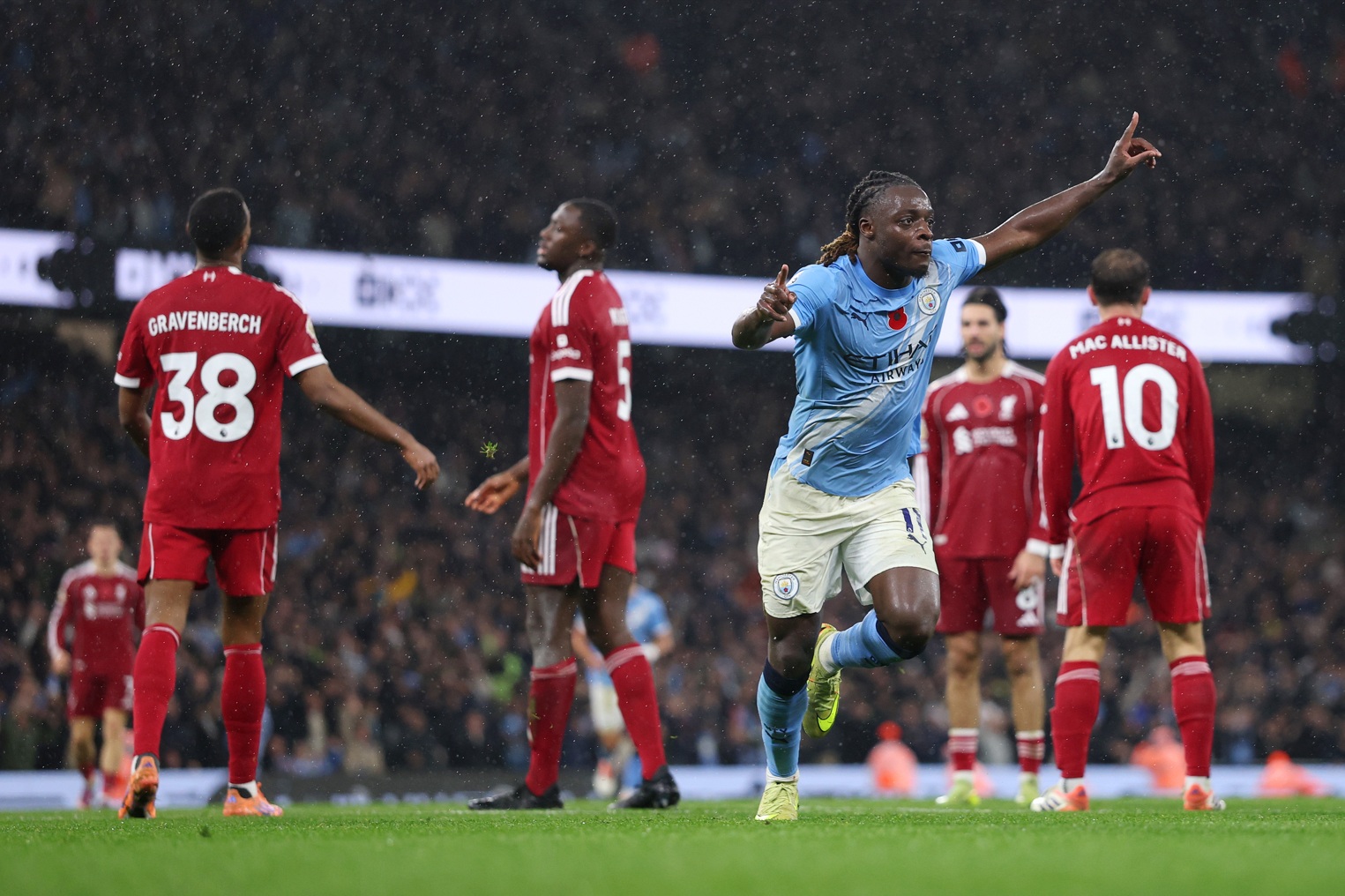 Jeremy Doku celebrates his goal in Man City's 3-0 win over Liverpool