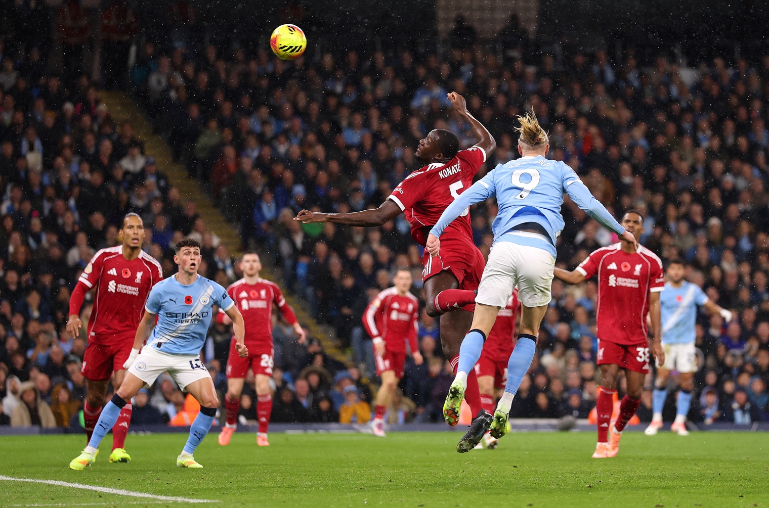 Erling Haaland gets above Ibrahima Konate to score Man City's first goal against Liverpool on Sunday