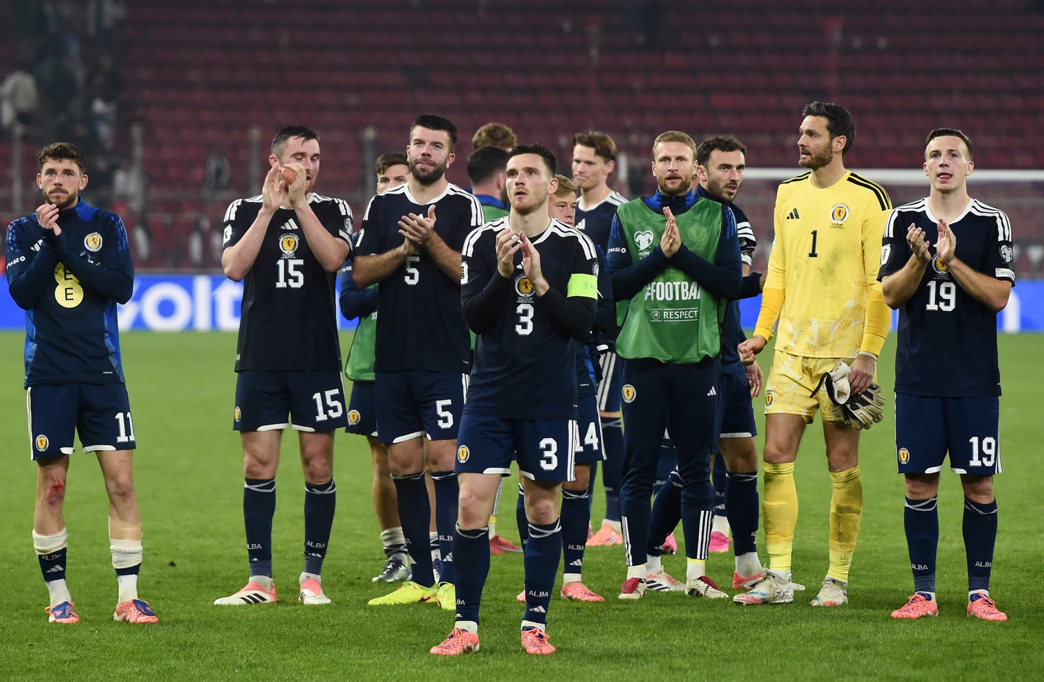 Andy Robertson and his teammates applaud the Scotland fans after the 3-2 defeat to Greece on Saturday