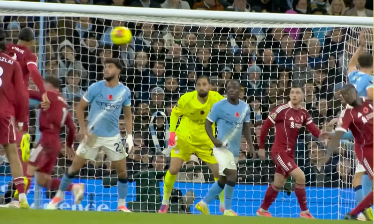 Jeremy Doku was standing in front of Gianluigi Donnarumma, with Andy Roberston a couple of steps to the goalkeeper's left