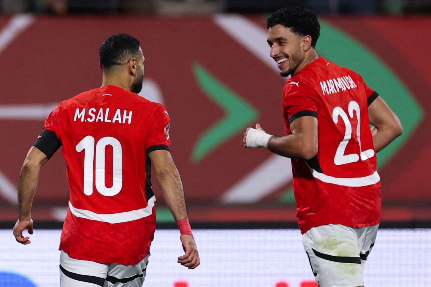 Mo Salah and Omar Marmoush celebrate scoring against Zimbabwe for Egypt