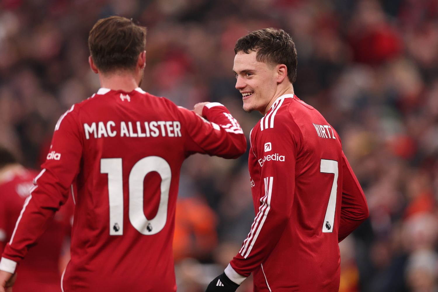 Florian Wirtz congratulated by Alexis Mac Allister after scoring against Wolves