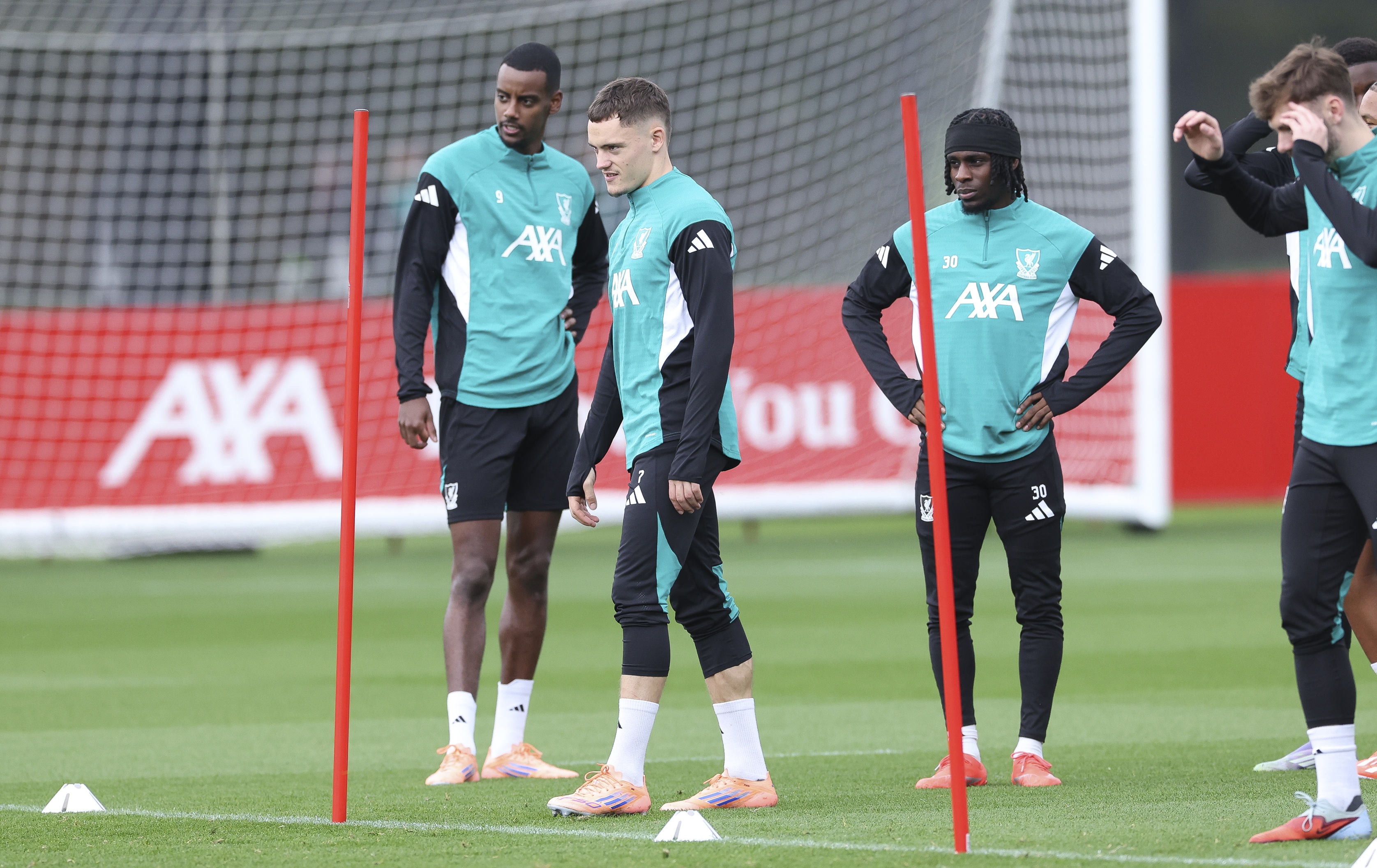 Florian Wirtz and Alexander Isak stand side by side in Liverpool training.