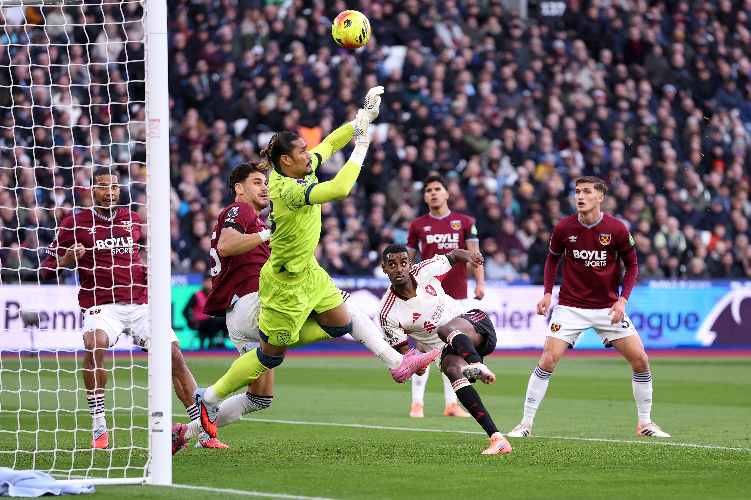 Alphonse Areola saves Alexander Isak's shot.