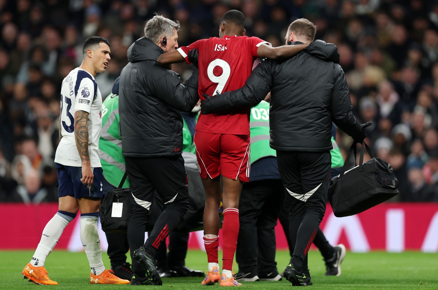 Alexander Isak goes off injured after scoring Liverpool's first goal against Tottenham