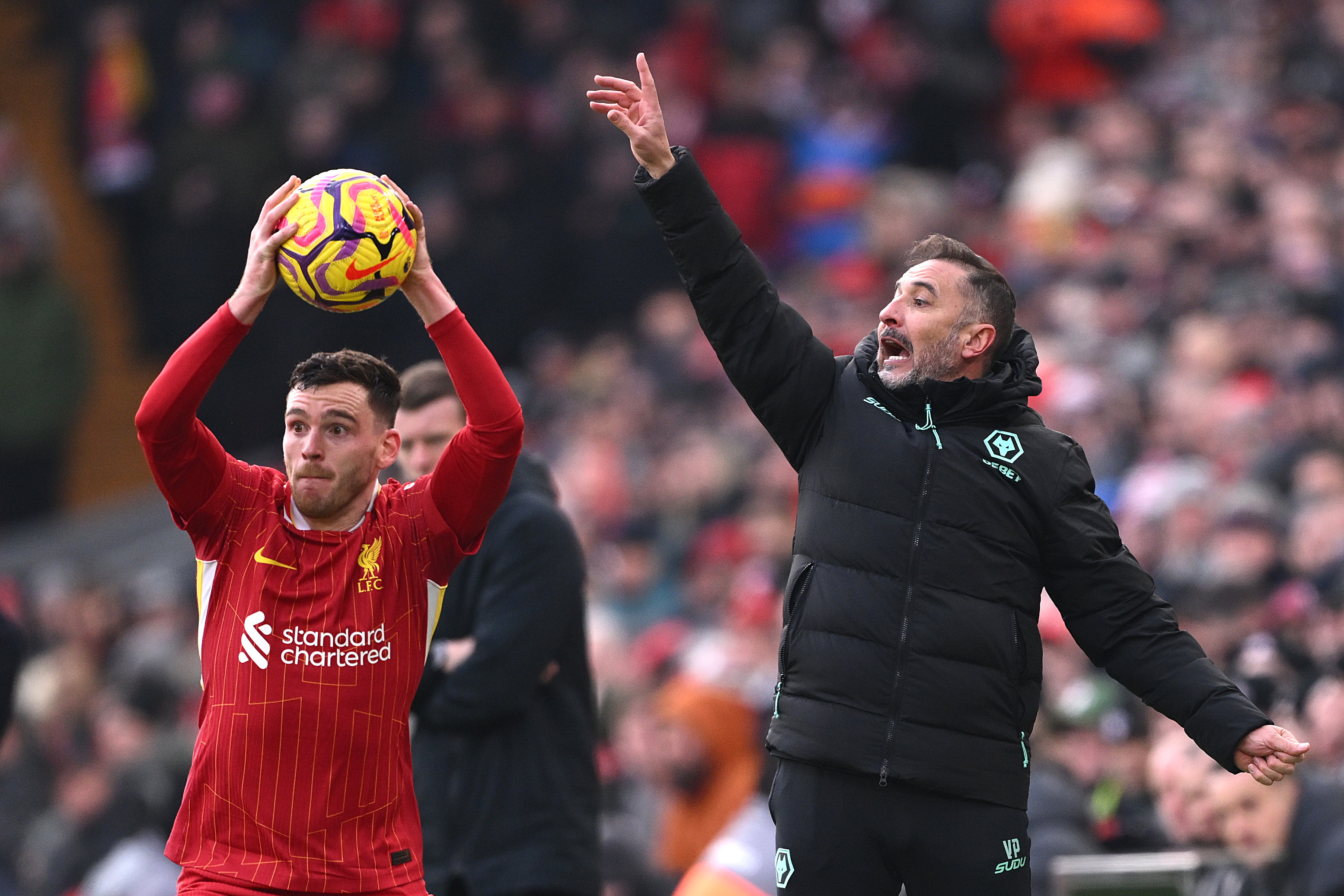 Andy Robertson takes a throw-in for Liverpool during their victory over Wolves in February 2025