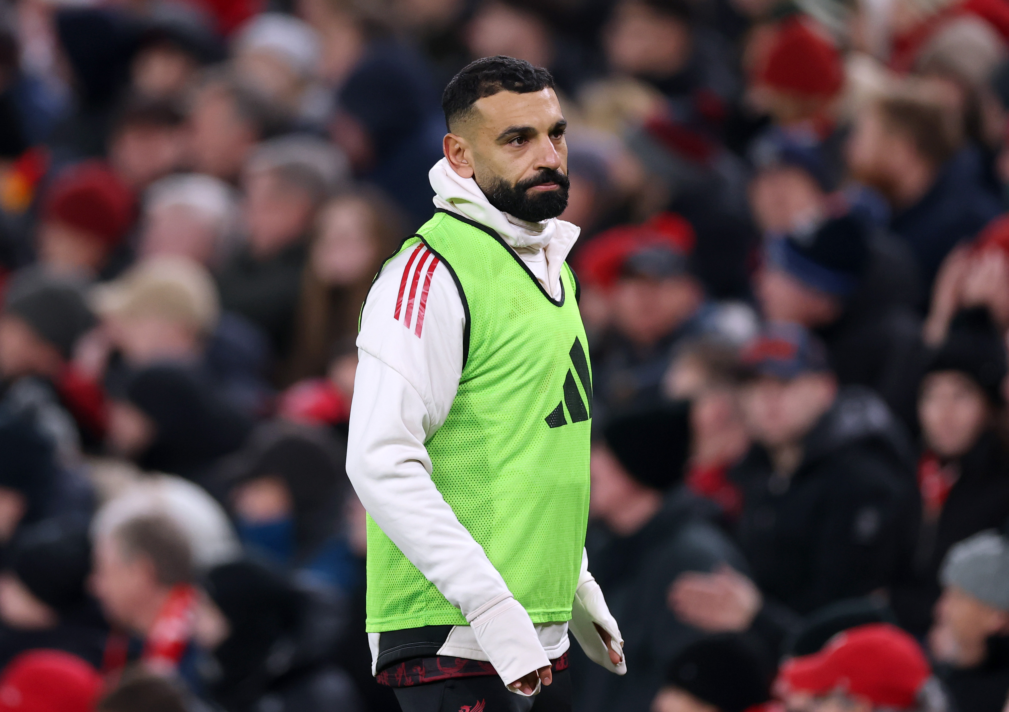 Mo Salah warms up as a sub against Sunderland