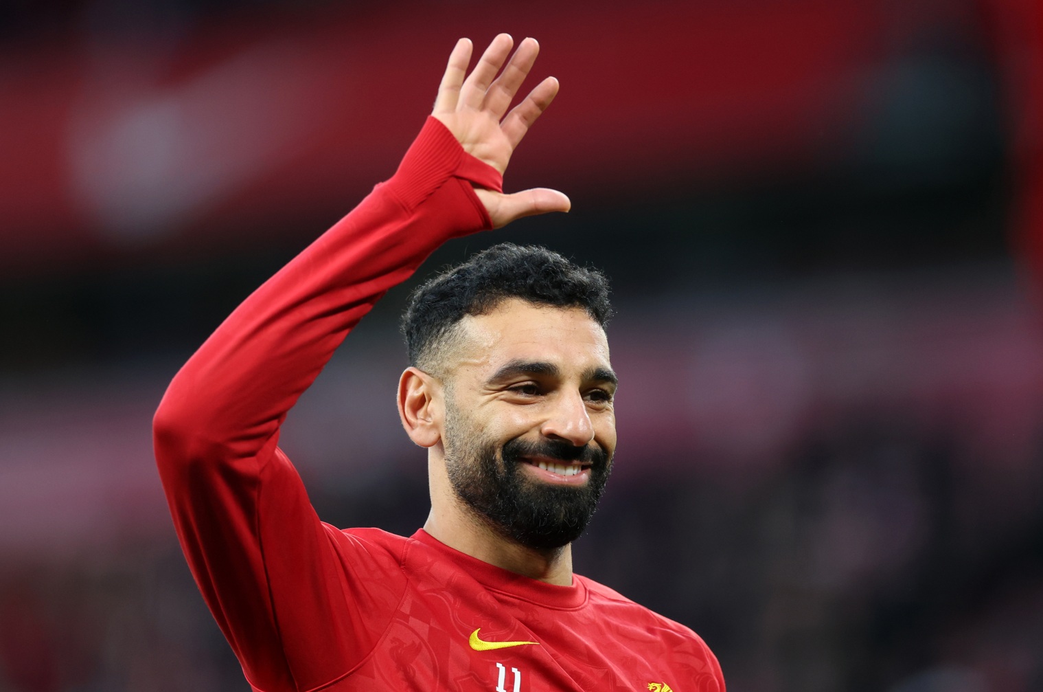 Mo Salah waves to Liverpool fans at Anfield