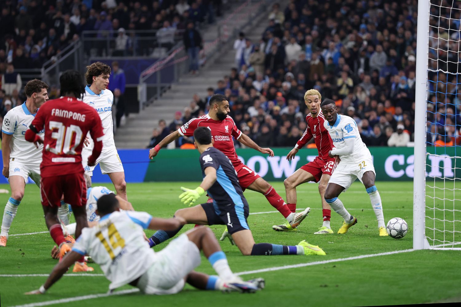 Timothy Weah looks on as Geronimo Rulli of Marseille scores an own goal against Liverpool
