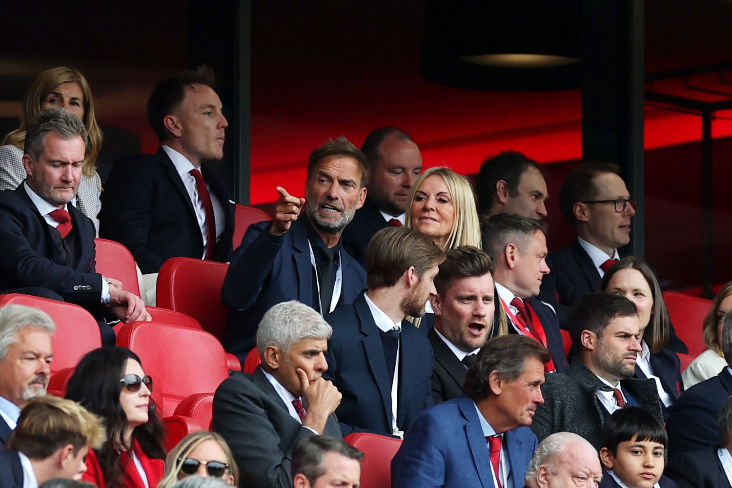 Former Liverpool Manager and current Head of Global Soccer for Red Bull GmbH Juergen Klopp speaks with Wife Ulla Sandrock during the Premier League match between Liverpool FC and Crystal Palace