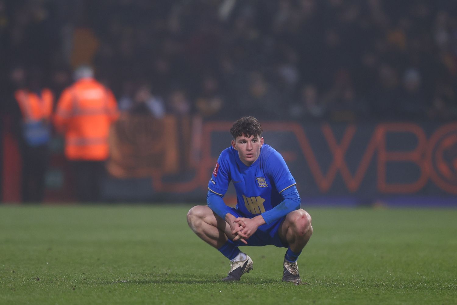 Lewis Koumas of Birmingham City crouches down and looks on