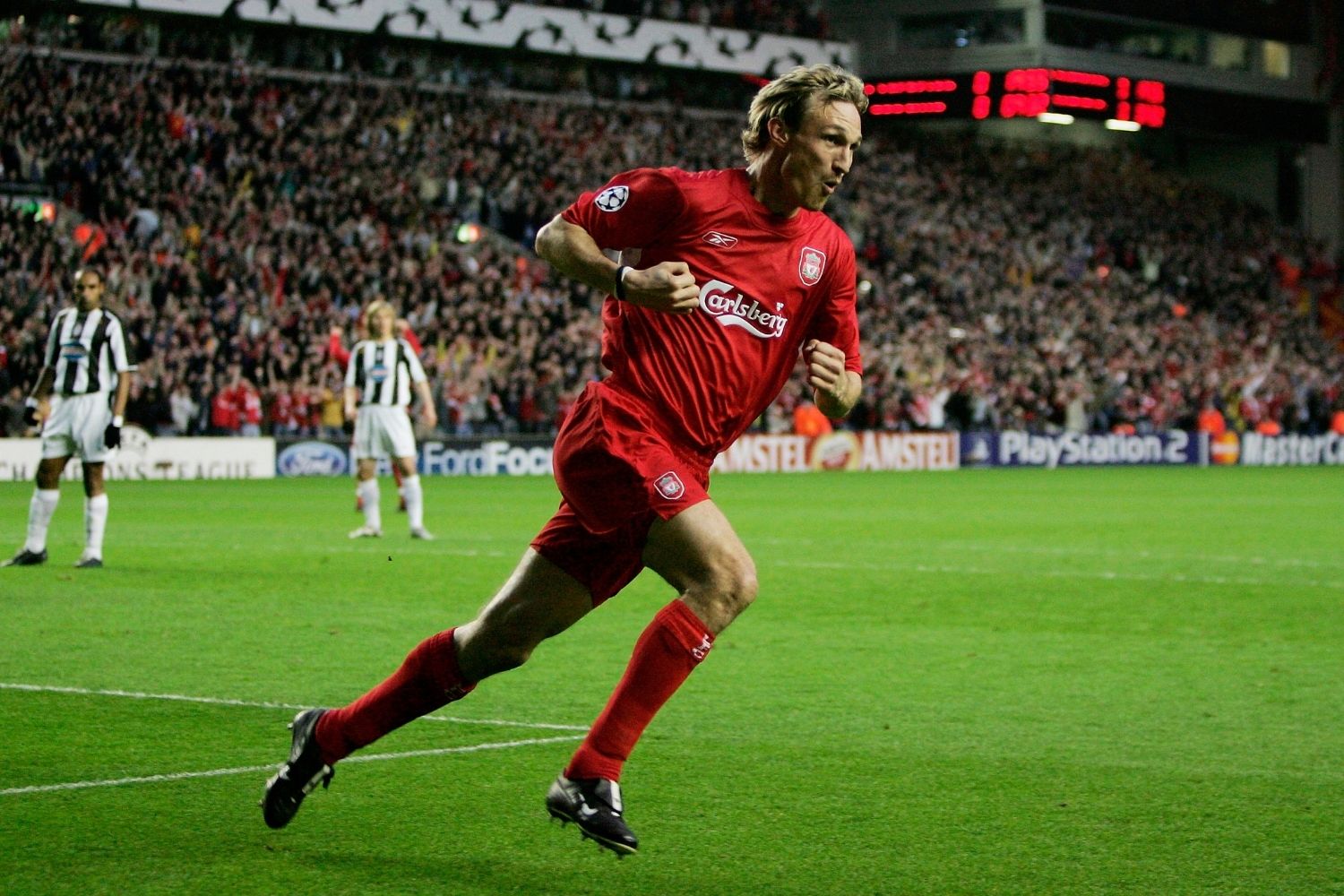 Sami Hyypia of Liverpool celebrates scoring the first goal of the game during the UEFA Champions League Quater-final, first leg match between Liverpool and Juventus at Anfield