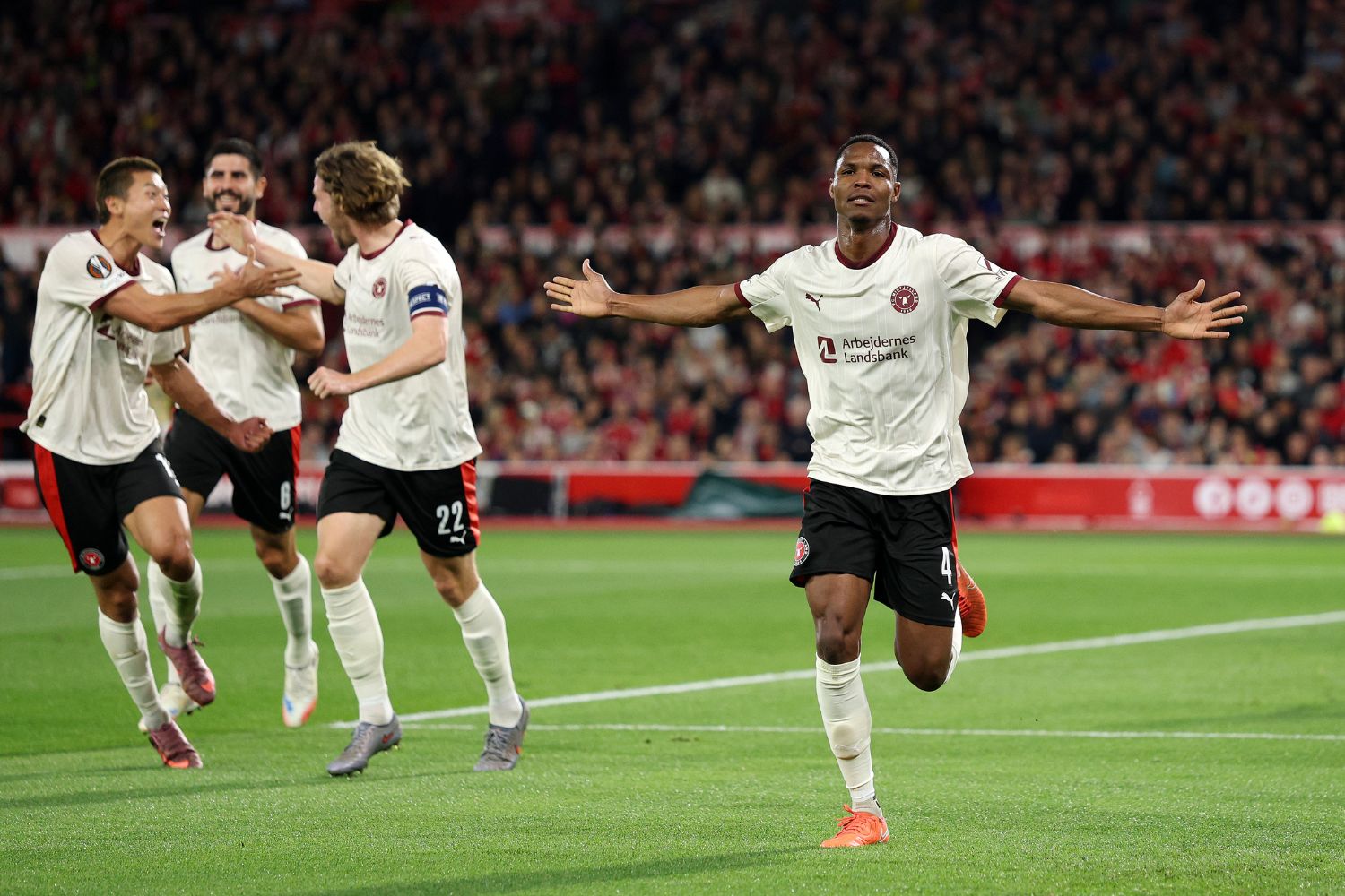 Ousmane Diao of FC Midtjylland celebrates scoring his team's first goal during the UEFA Europa League 2025/26 League Phase MD2 match between Nottingham Forest FC and FC Midtjylland