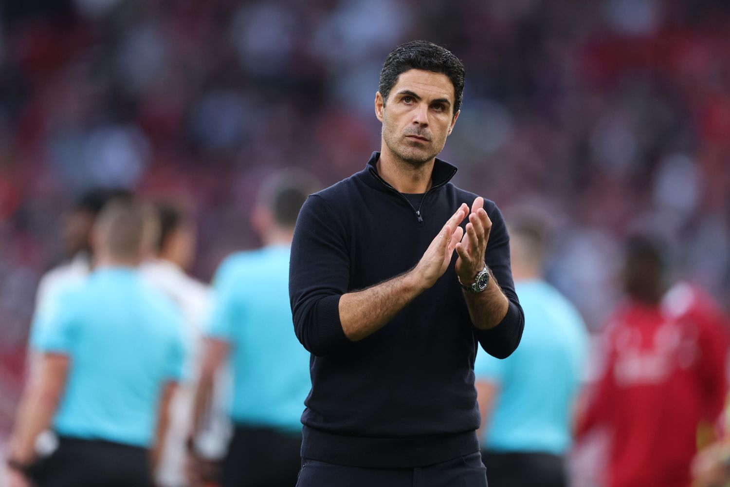 Mikel Arteta coaches Arsenal at Anfield