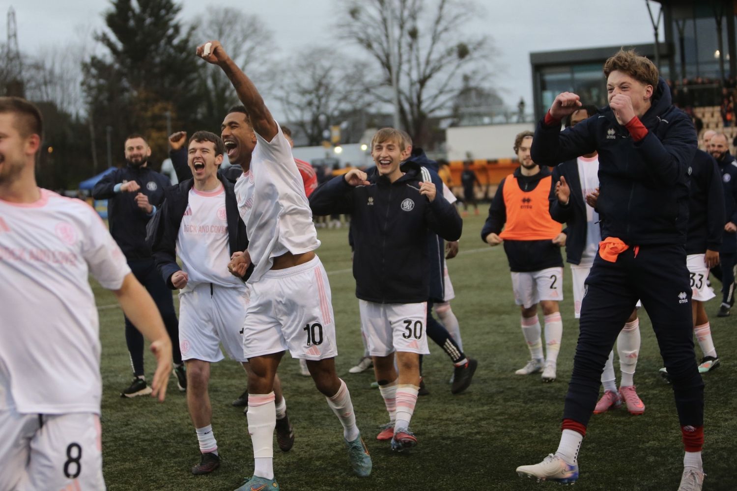 Max Woltman celebrates with Macclesfield teammates