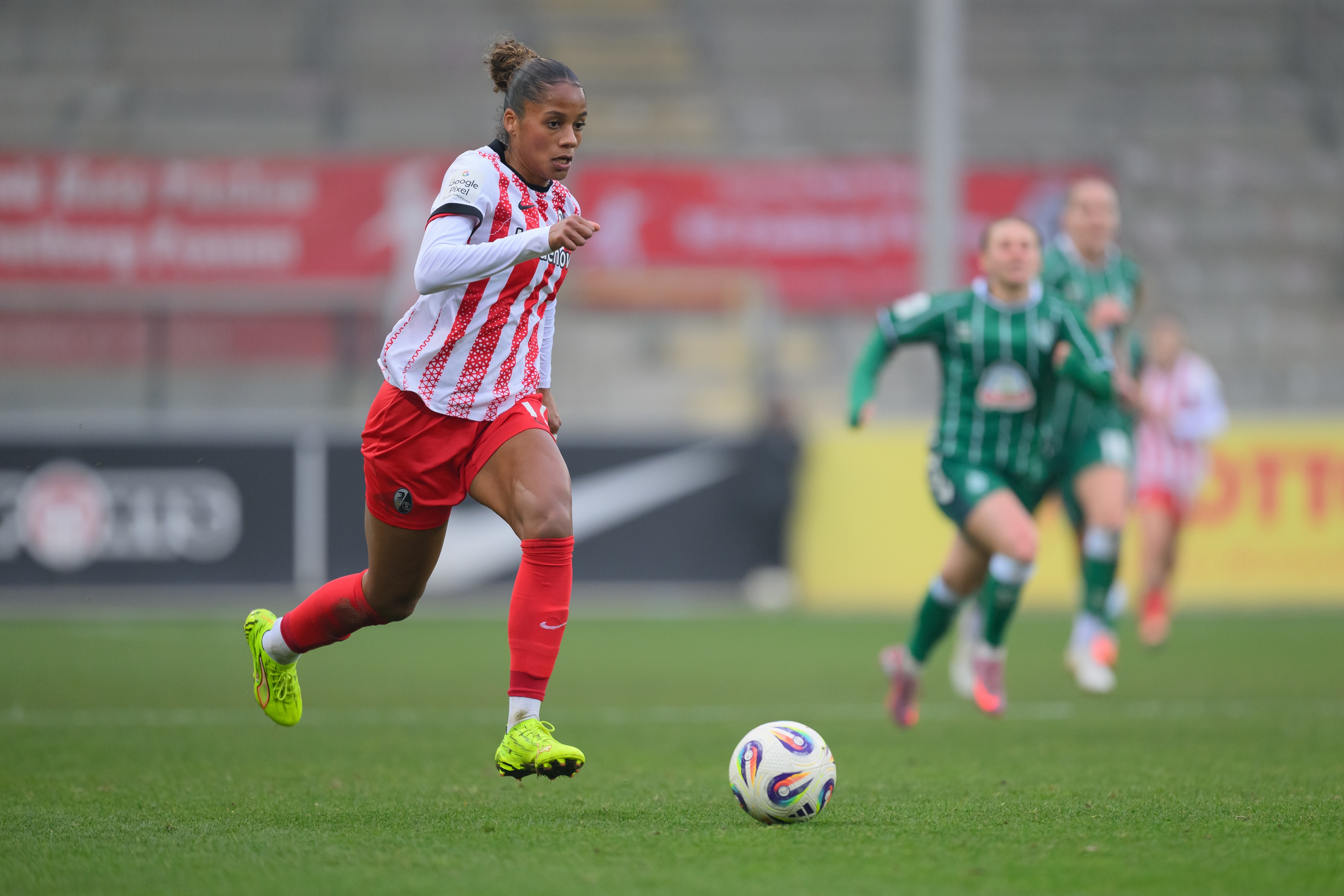 Aurelie Csillag dribbles with the ball.