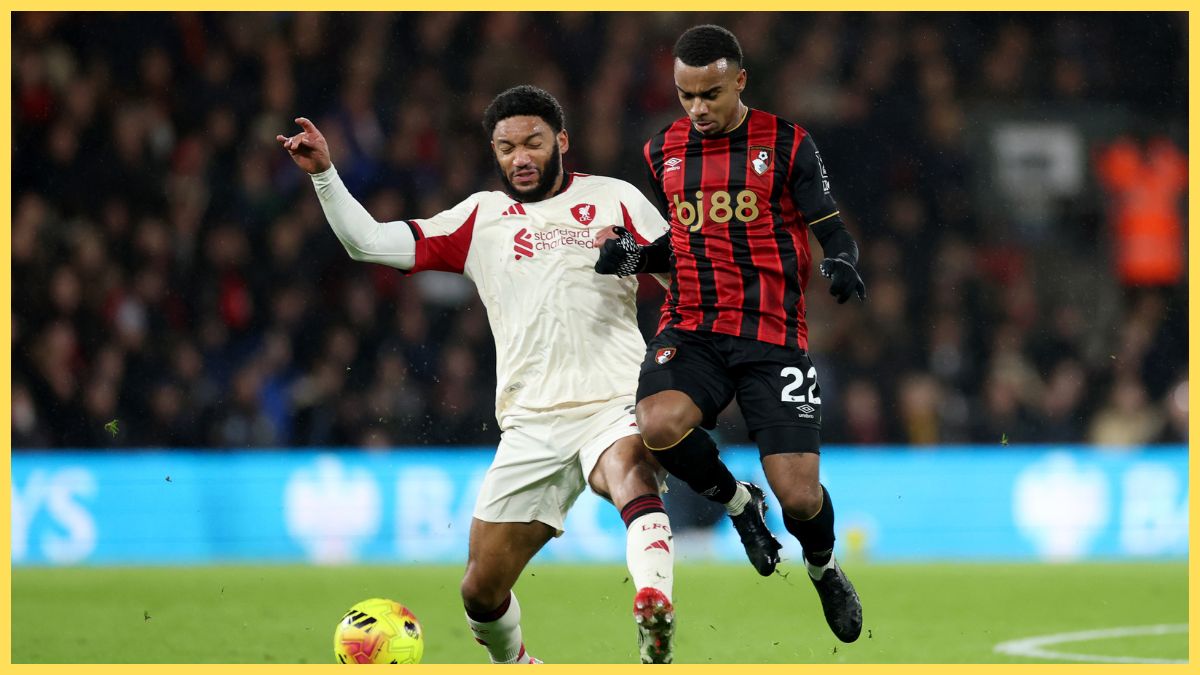 Joe Gomez of Liverpool is challenged by Eli Junior Kroupi of AFC Bournemouth