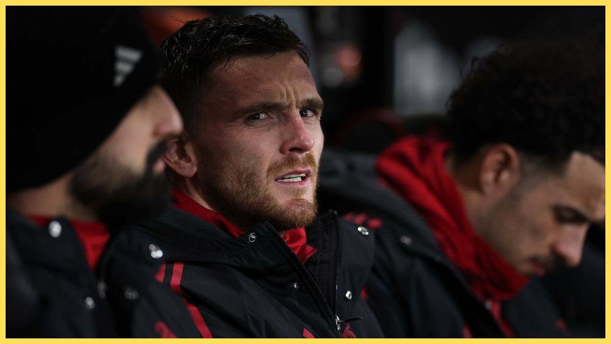 Andy Robertson sits on the bench against Bournemouth
