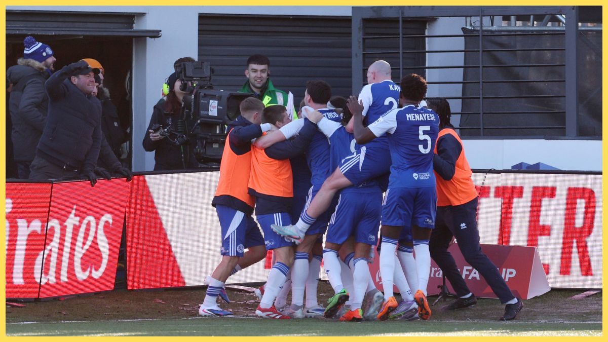 Paul Dawson of Macclesfield (obscured) celebrates scoring his team's first goal with teammates during the Emirates FA Cup Third Round match between Macclesfield and Crystal Palace