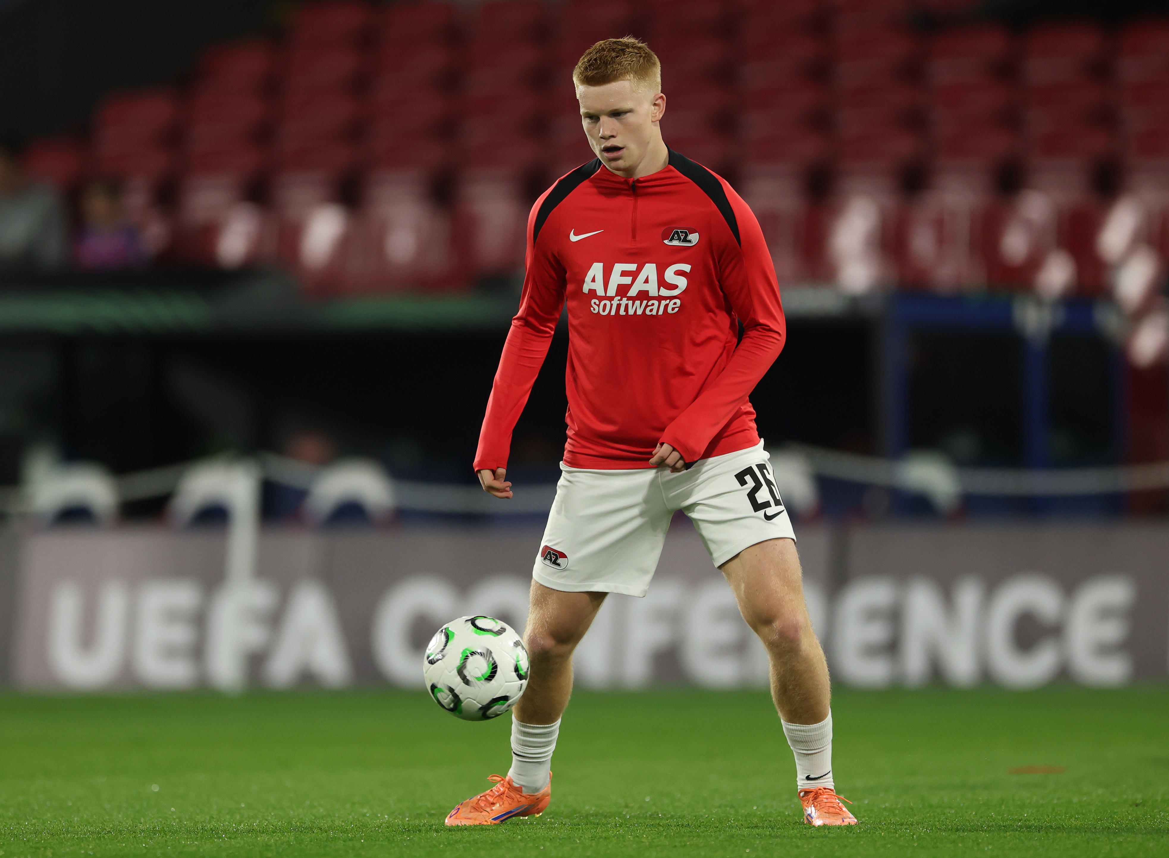 Kees Smit warms up with a football.