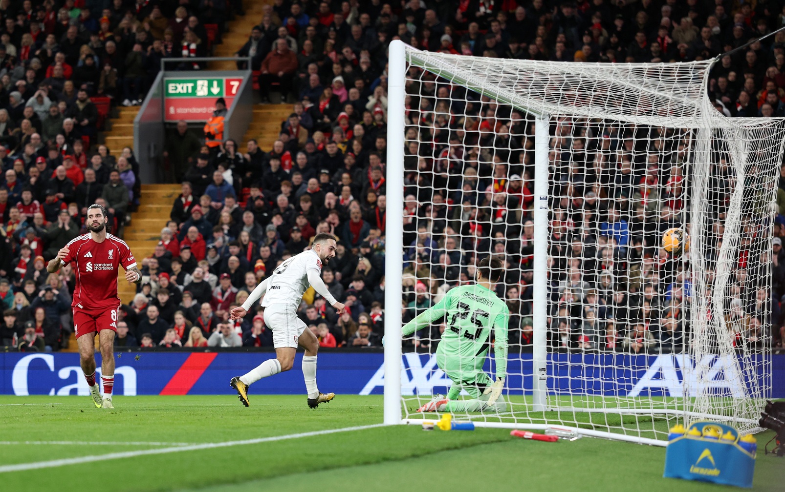Adam Phillips scores against Liverpool at Anfield in a 4-1 defeat for Barnsley