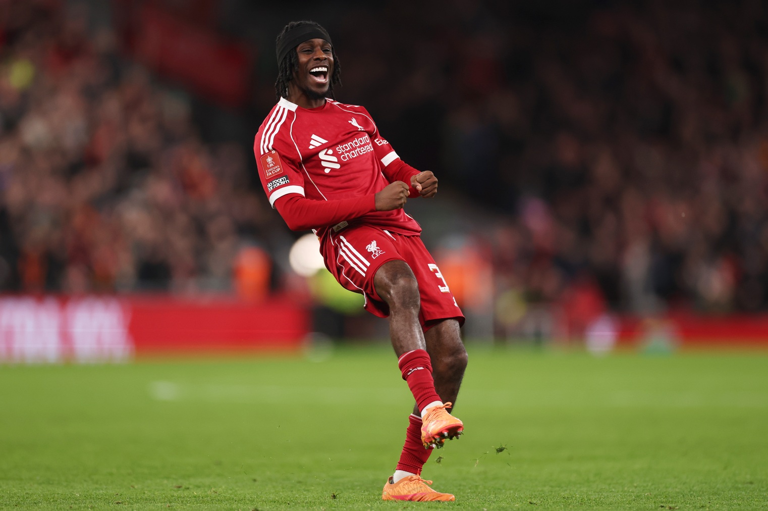 Jeremie Frimpong celebrates his goal in Liverpool's 4-1 win over Barnsley on Monday night