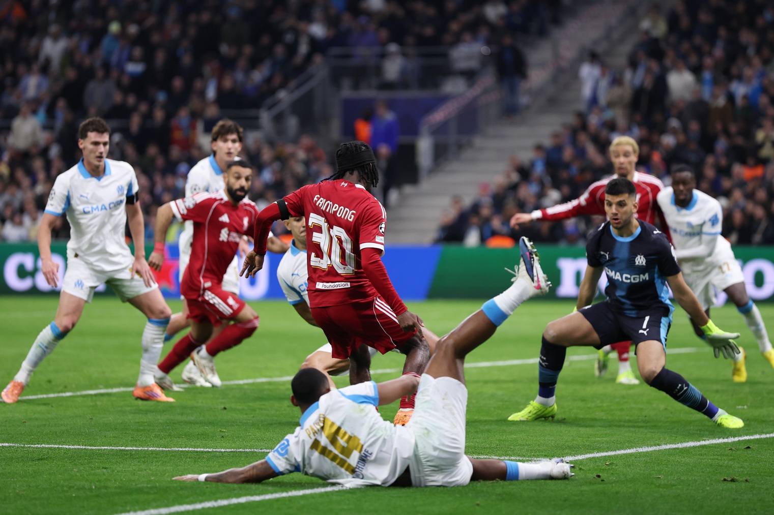 Jeremie Frimpong hits the ball off Geronimo Rulli and into the Marseille net to double Liverpool's lead