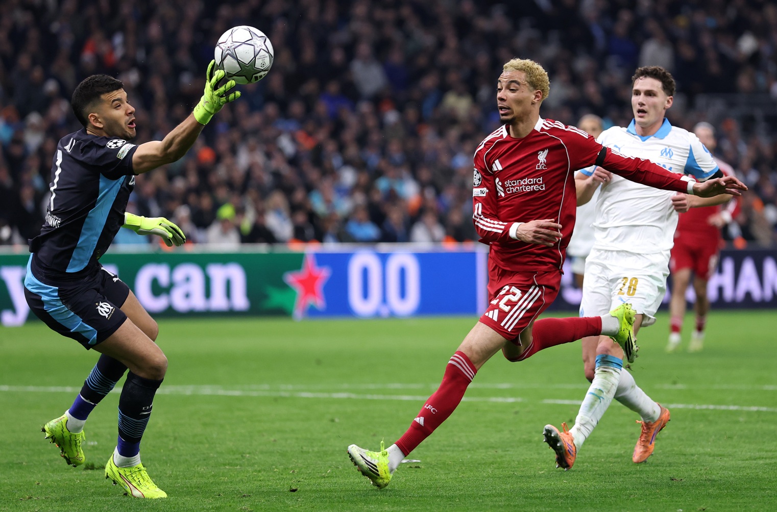 Geronimo Rulli saves from Hugo Ekitike in Liverpool's 3-0 win over Marseille