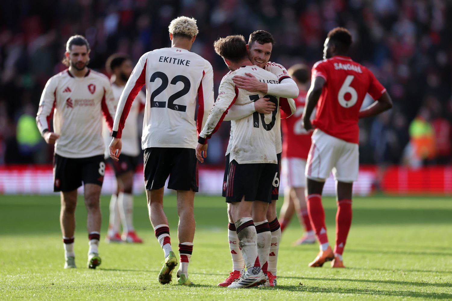 Andy Robertson congratulates Alexis Mac Allister after scoring against Nottingham Forest