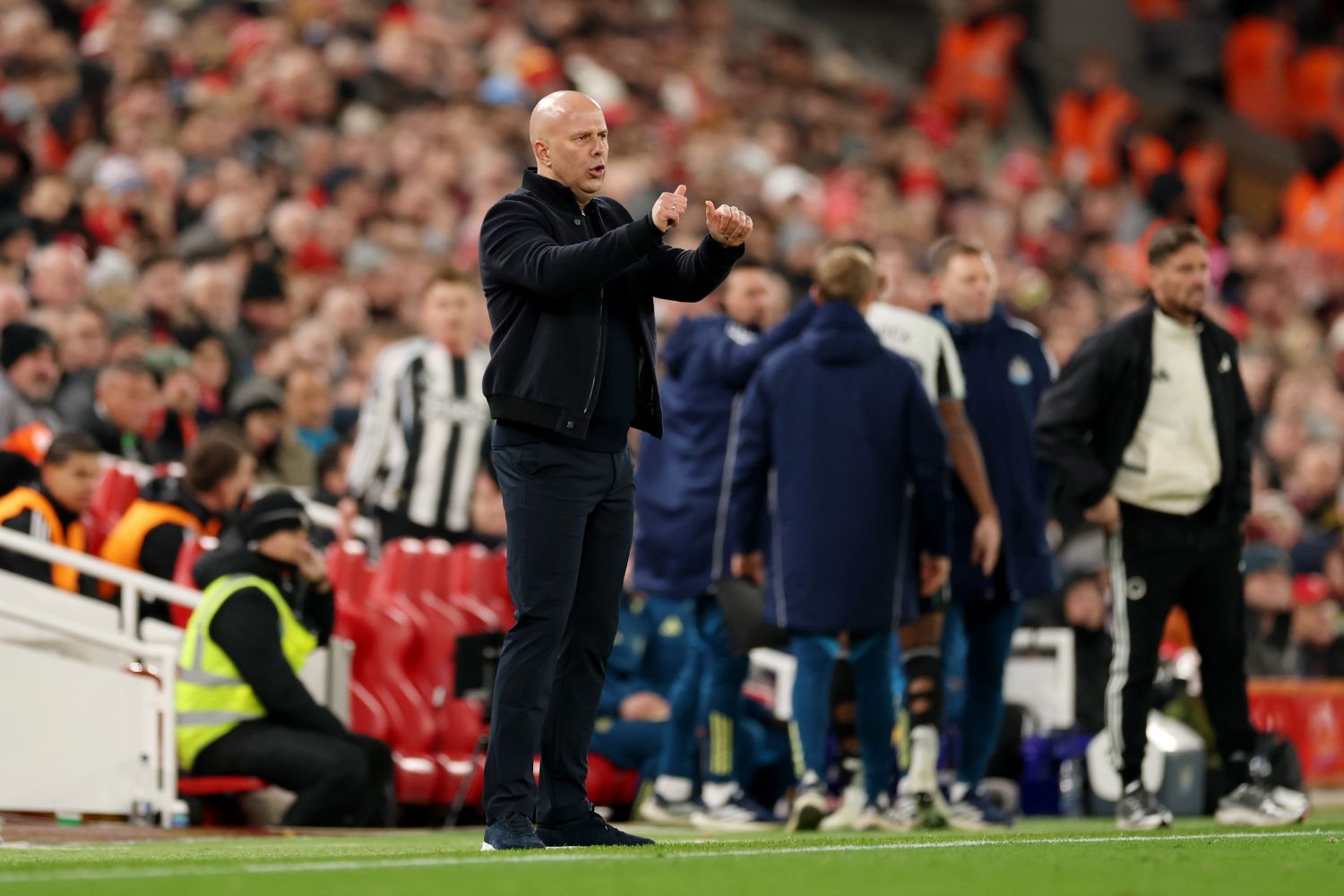 Arne Slot coaches Liverpool against Newcastle