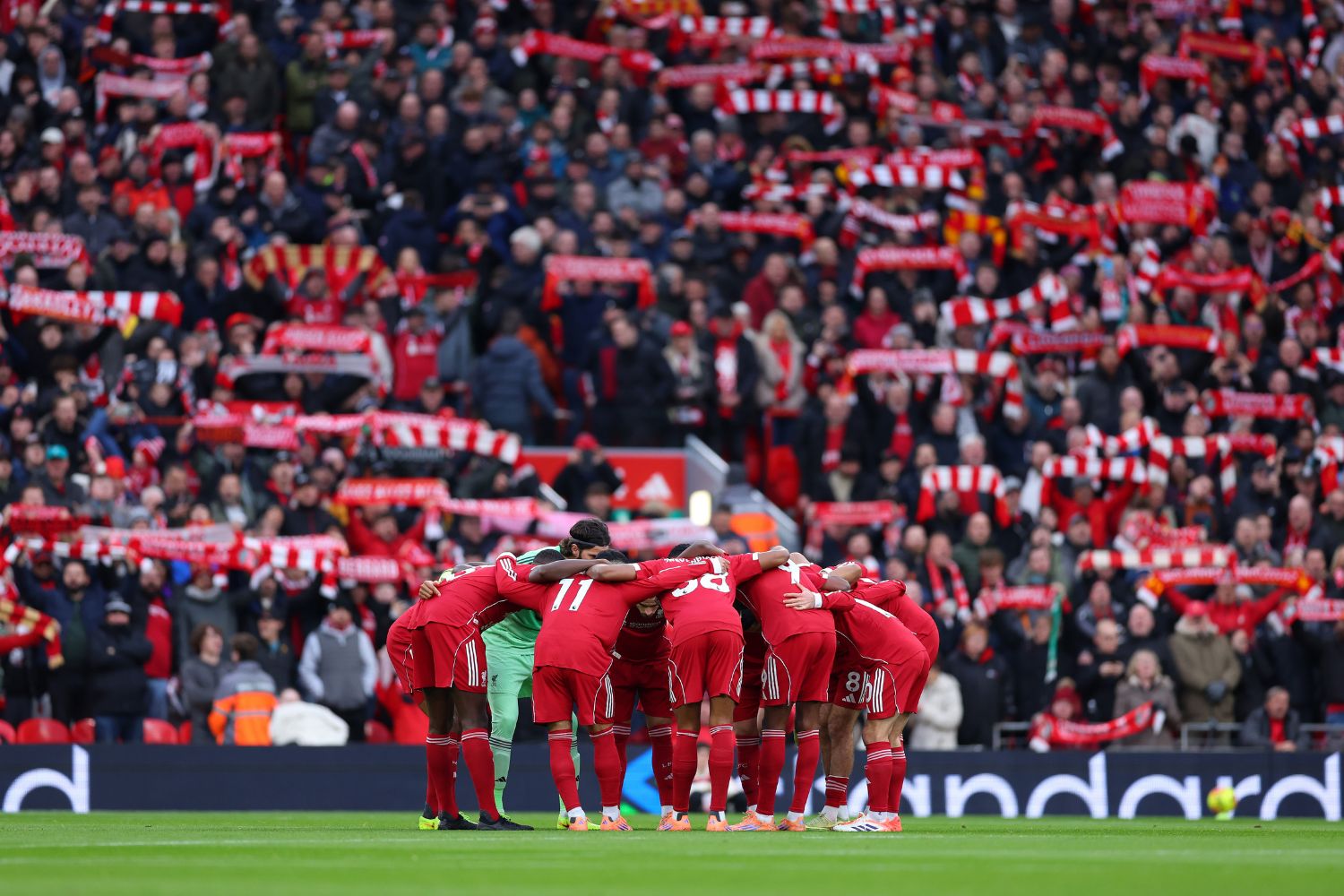 General view inside the stadium as players of Liverpool form a team huddle prior to the Premier League match between Liverpool and Nottingham Forest