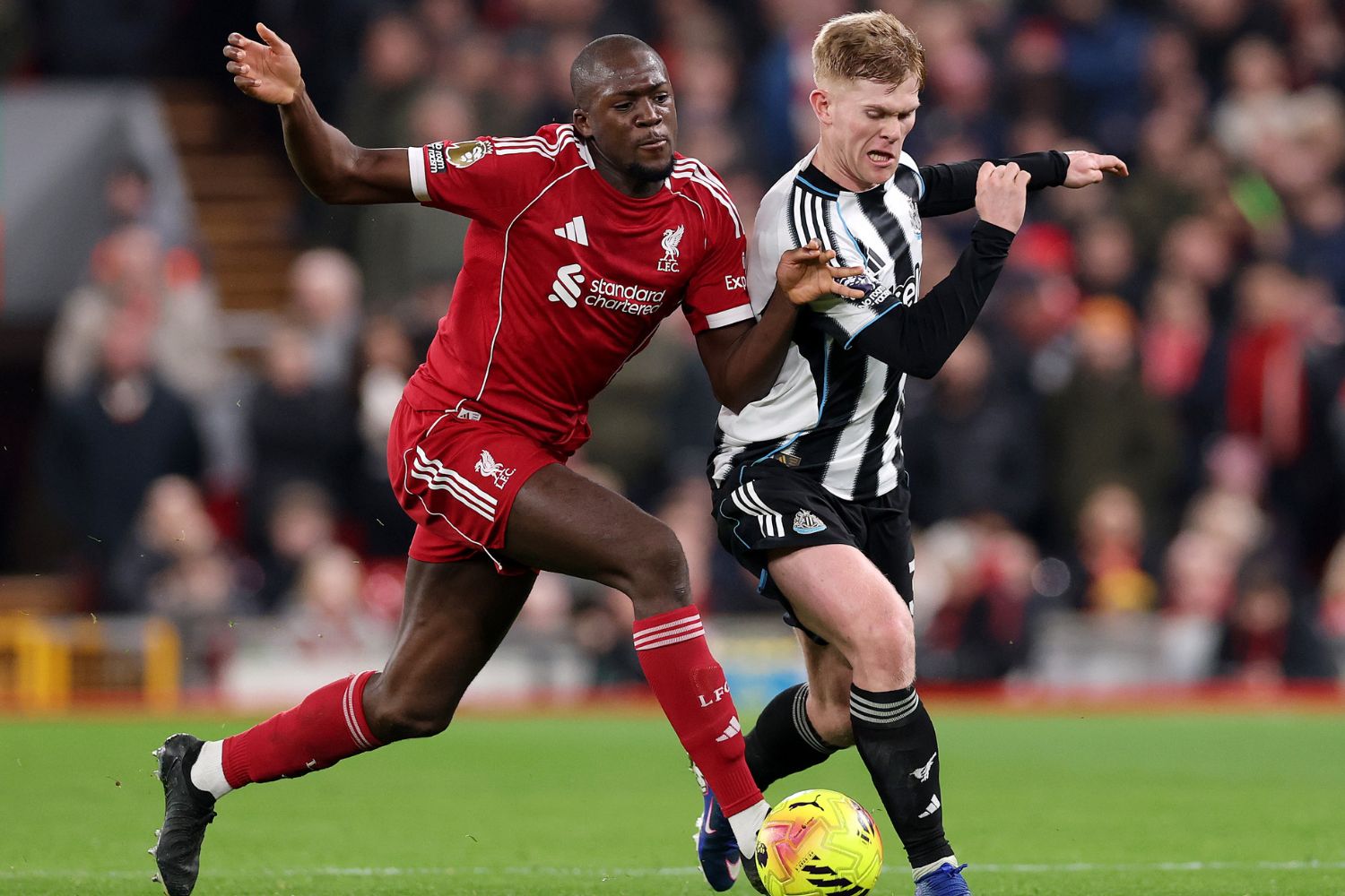 Ibou Konate battles with Lewis Hall of Newcastle