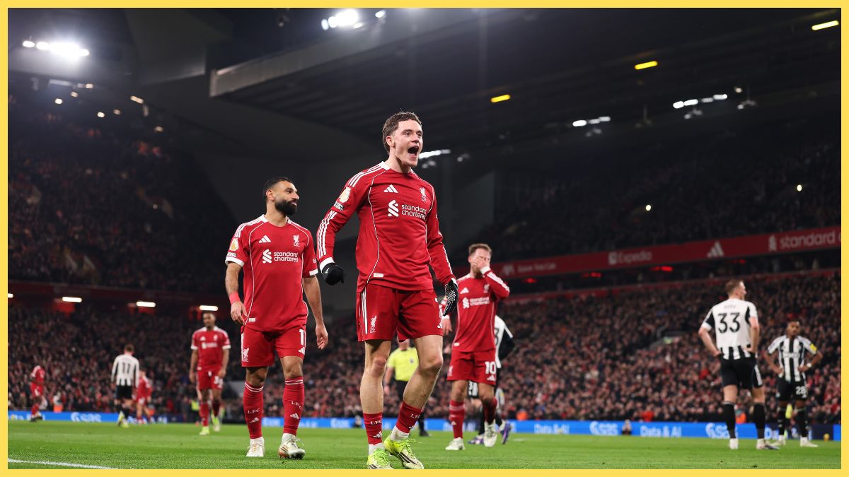 Florian Wirtz celebrates in front of the Kop