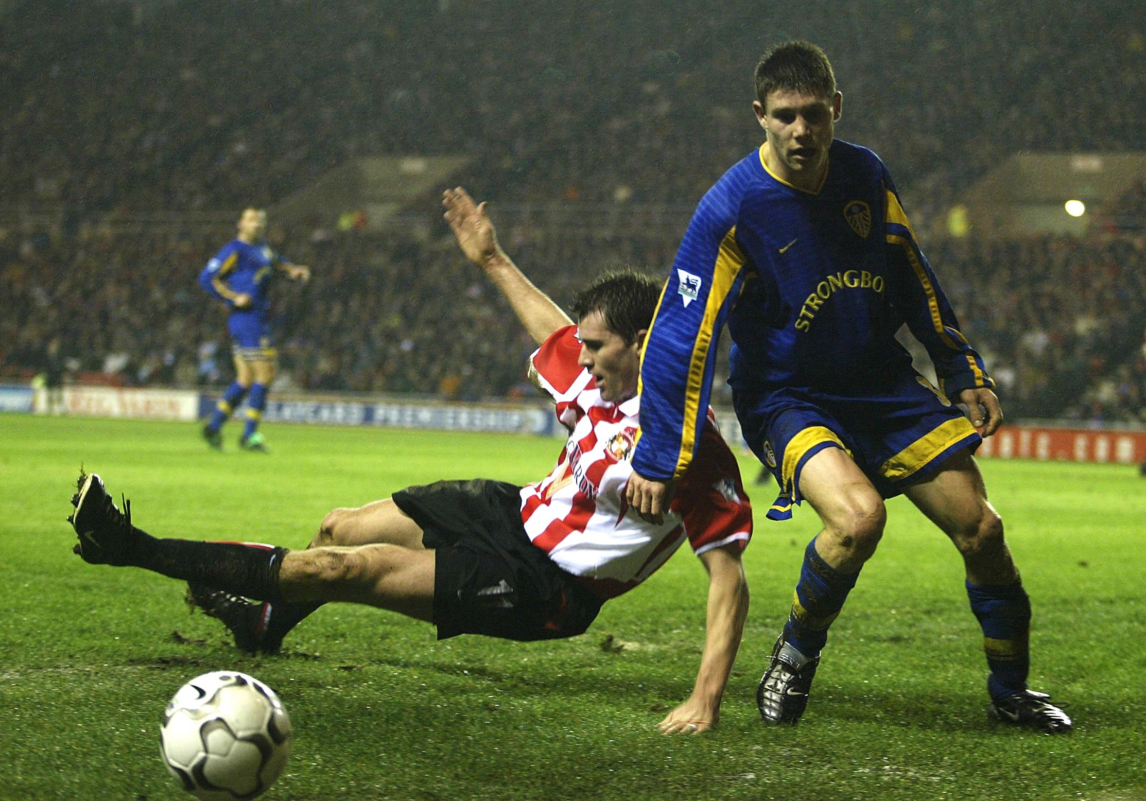 James Milner challenges Kevin Kilbane on one of his first Premier League appearances for Leeds in 2002