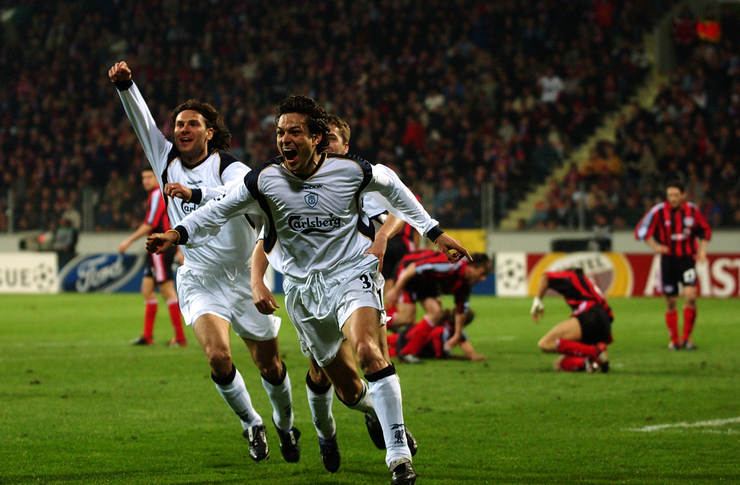 Jari Litmanen celebrates scoring for Liverpool against Bayer Leverkusen in 2002