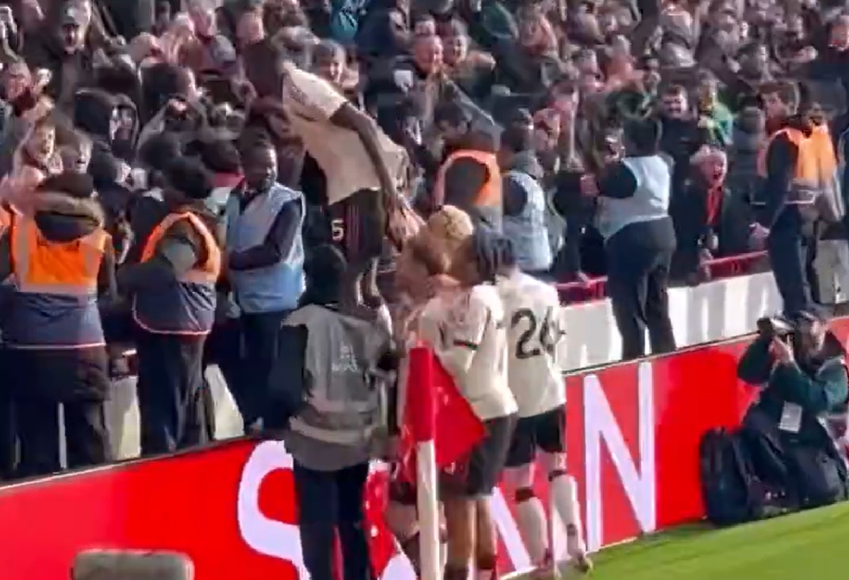 Ibrahima Konate celebrates with Liverpool fans after Alexis Mac Allister's last-gasp winner at Nottingham Forest